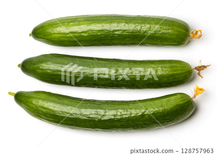 Photo of three green ripe natural organic cucumbers isolated on white background 128757963