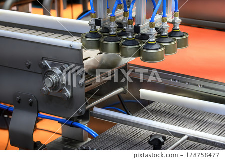 The high technology material handling process in canned food production by robotic system. 128758477