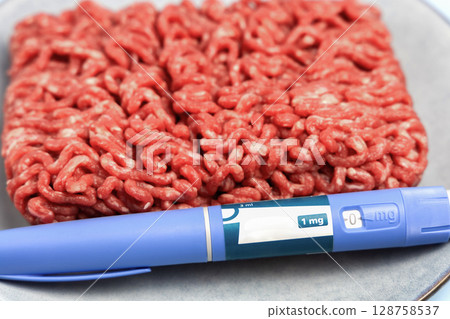 Ozempic Insulin injection pen and raw minced meat for diabetics and weight loss. 128758537