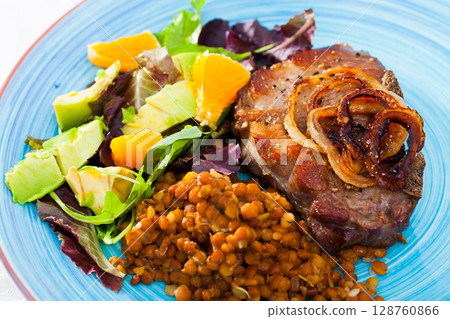 Grilled pork with vegetables and lentils Grilled pork with vegetables and lentils 128760866