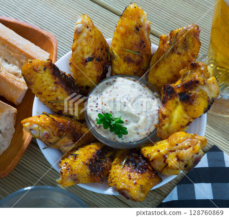 Beer snack - roasted chicken wings 128760869