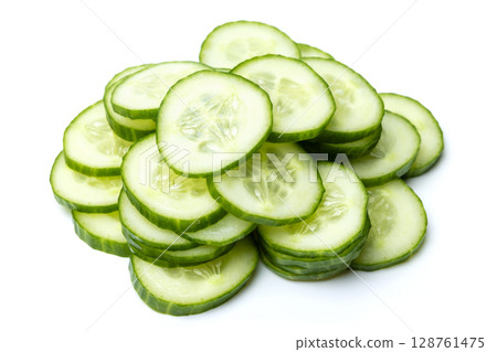 Photo of small bunch of green ripe natural organic cucumber sliced into circles isolated on white background 128761475