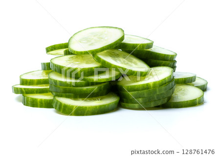 Photo of small bunch of green ripe natural organic cucumber sliced into circles isolated on white background Photo of small bunch of green ripe natural organic cucumber sliced into circles isolated on white background 128761476