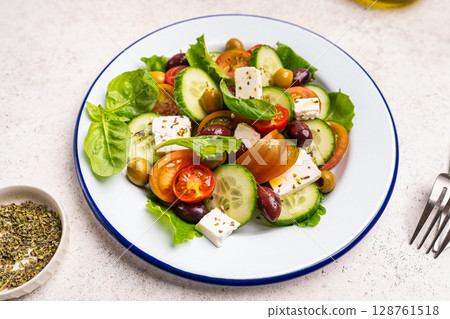 Greek salad with fresh vegetables 128761518