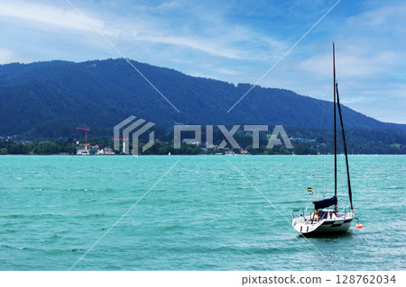 Summer day at lake Tegernsee, Bavaria. yacht on the water 128762034