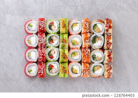 Assorted Colorful Sushi Roll Medley Featuring Shrimp Mango Avocado Cream Cheese Assorted Colorful Sushi Roll Medley Featuring Shrimp Mango Avocado Cream Cheese 128764403
