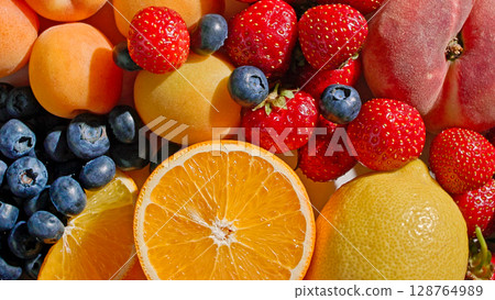 various fresh fruits background 128764989