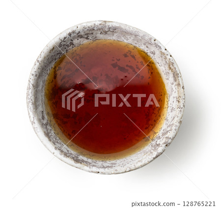 bowl of maple syrup bowl of maple syrup 128765221