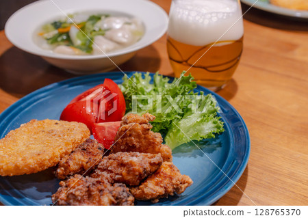 A hearty dinner of fried chicken, boiled dumplings and vegetable soup A hearty dinner of fried chicken, boiled dumplings and vegetable soup 128765370
