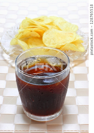 Cold cola and potato chips (vertical composition) 128765518