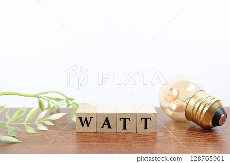 用燈泡和“WATT”一詞來表示功耗的圖像 用燈泡和“WATT”一詞來表示功耗的圖像 128765901
