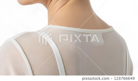 Blank innerwear strap under sheer top, isolated back view 128766649
