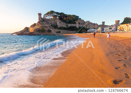 Morning beach at Vila Vella in Tossa de Mar, Spain 128766674