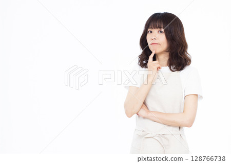 A housewife who is seriously worried A housewife who is seriously worried 128766738