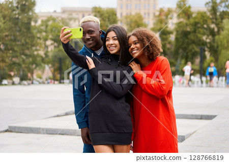 Multi ethnic friends outdoor. Diverse group people 128766819