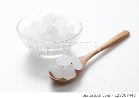 Rock sugar on white background Rock sugar on white background 128767448