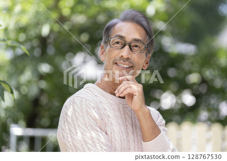 A smiley male in his 60's 128767530
