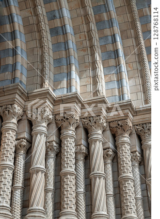 Tiled archway and pilasters at the main entrance of the Natural History Museum. 128768114