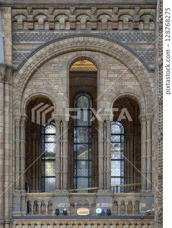 The richly detailed stonework walls and prominent stained glass windows, reflects a blend of Romanesque and Victorian Gothic Revival architectural styles. The richly detailed stonework walls and prominent stained glass windows, reflects a blend of Romanesque and Victorian Gothic Revival architectural styles. 128768275