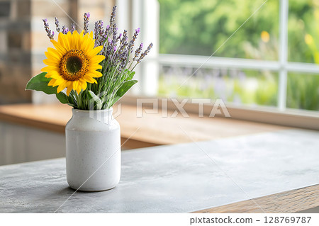 Bright Sunflower and Lavender Arrange in White Vase at Modern Kitchen Table 128769787