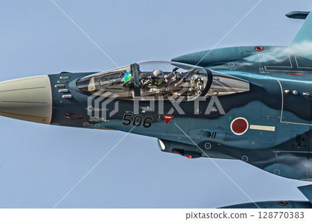 fighter plane flying in the sky 128770383