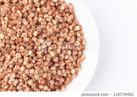 Close-up of sorghum in a plate 128770482