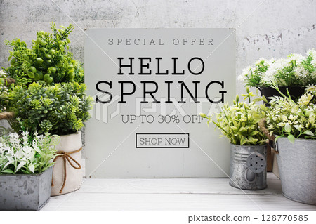 Hello Spring Sale 30% off Promotion Offer Discount Retail Shopping Concept 128770585