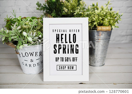 Hello Spring Sale 50% off Promotion Offer Discount Retail Shopping Concept Hello Spring Sale 50% off Promotion Offer Discount Retail Shopping Concept 128770601