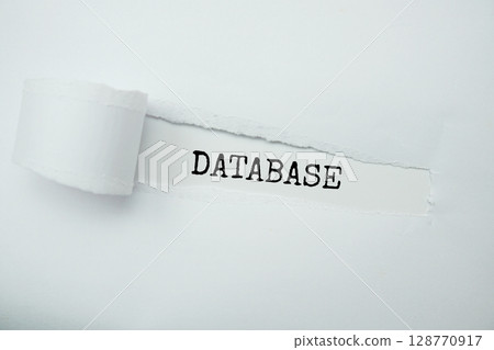 Database message written on white paper with torn paper background 128770917