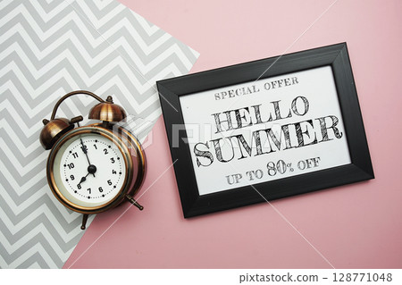 Hello Summer Sale 80% off with alarm clock on pink background Hello Summer Sale 80% off with alarm clock on pink background 128771048