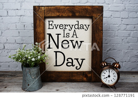 Everyday Is A New Day Motivational and Inspirational quotes on wooden background Everyday Is A New Day Motivational and Inspirational quotes on wooden background 128771191
