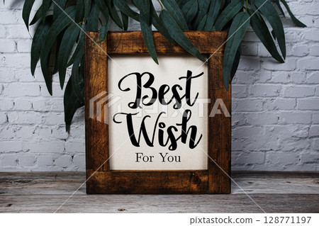 Best Wishes For You text with green leaf decorate on wooden background Best Wishes For You text with green leaf decorate on wooden background 128771197