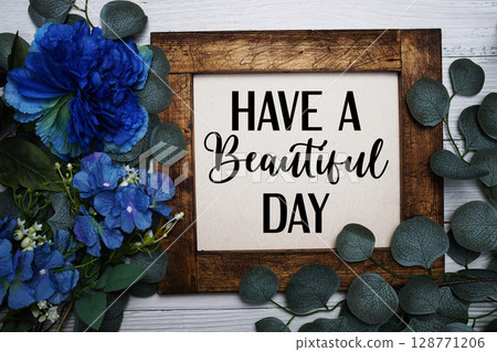Have a Beautiful Day text with flowers bouquet decoration on wooden background Have a Beautiful Day text with flowers bouquet decoration on wooden background 128771206