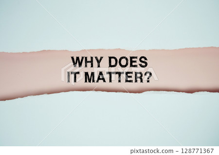 Why Does It Matter? text on pink with white paper torn ripped of horizontal 128771367