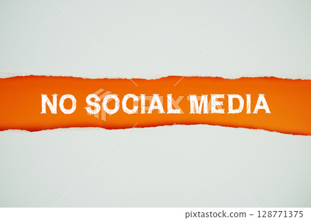 No Social Media text on orange with white paper torn ripped of horizontal No Social Media text on orange with white paper torn ripped of horizontal 128771375