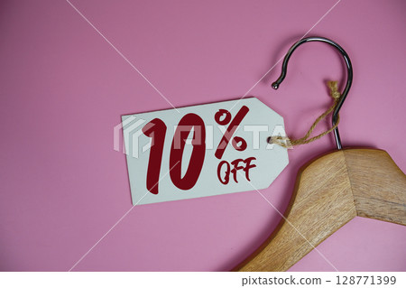 Sale 10% off price tag label with Clothes hanger Clothing Promotion shopping concept 128771399