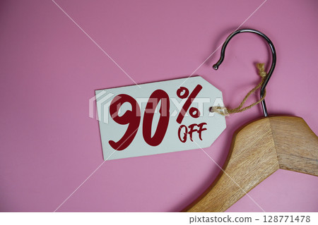 Sale 90% off price tag label with Clothes hanger fashion shopping concept 128771478