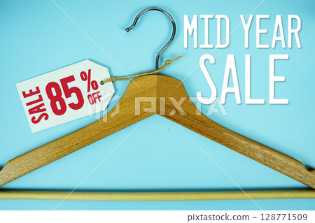 Great Discount Sale 85% off price tag label with Clothes hanger Clothing Promotion shopping concept 128771509