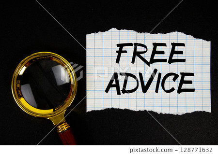 Free Advice text written on paper with magnifying glass Free Advice text written on paper with magnifying glass 128771632