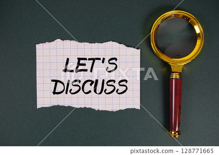Let's Discuss text written on paper with magnifying glass 128771665