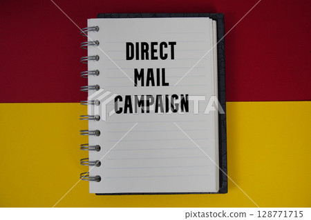Direct Mail Campaign text written on notebook paper 128771715