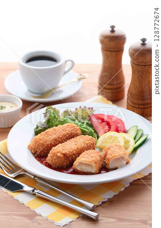 Western-style lunch plate with freshly fried cream croquettes 128772674