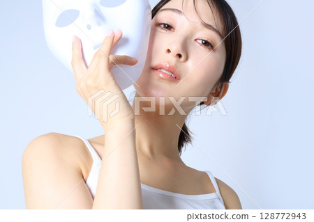 Woman with a mask Beauty image Woman with a mask Beauty image 128772943