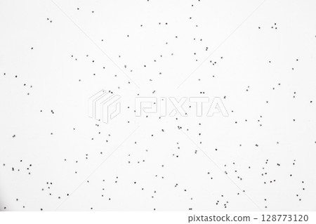 Poppy flower black seed on white background Poppy flower black seed on white background 128773120