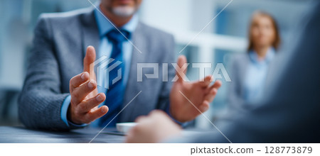 Hand gestures representing interpersonal interactions, proposals and agreements in a business environment 128773879
