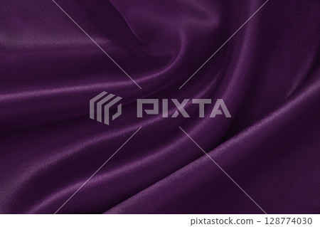 Purple fabric cloth texture for background and design art work, beautiful crumpled pattern of silk or linen. 128774030