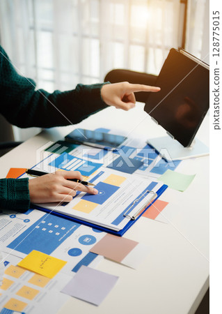 UX graphic designer planning application process development prototype wireframe for web smart phone. 128775015