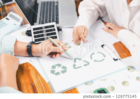 Business people working on sustainable innovation project. renewable energy concept. Teamwork Meeting, partner on model building company office technology, based green businesses and global warming. Business people working on sustainable innovation project. renewable energy concept. Teamwork Meeting, partner on model building company office technology, based green businesses and global warming. 128775145
