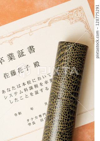 Close-up of diploma and tube 128775291