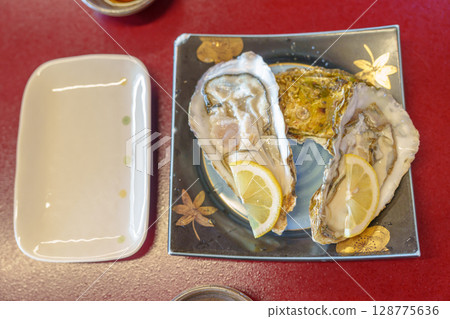 fresh Oyster in Matsushima fish market, seafood famous and popular of Matsushima bay in Miyagi Prefecture, Tohoku, Japan fresh Oyster in Matsushima fish market, seafood famous and popular of Matsushima bay in Miyagi Prefecture, Tohoku, Japan 128775636